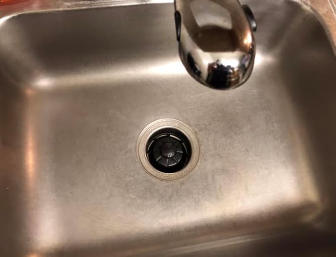Rocky Mountain Goods Sink Garbage Disposal Guard - Prevent Silverware from Slipping into Disposal - Sink Disposal Splash Guard - Universal Fit - Food Scraper for Easy Sink Cleaning