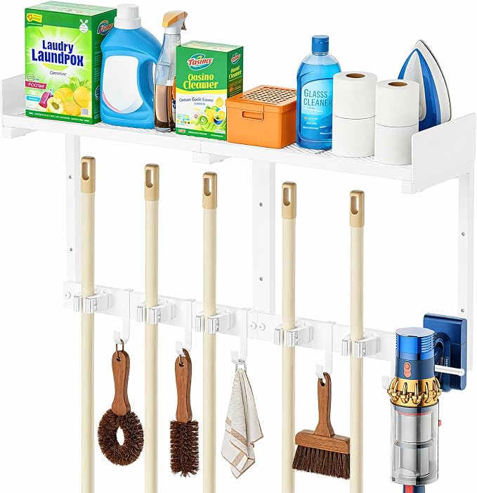 HUFAND Broom Holder Wall Mount, 27" Large Mop and Broom Organizer Wall Hanging with Top Storage Shelf & Vacuum Hook, Heavy Duty Iron Utility Rack for Laundry Room, Garage, Kitchen, Garden - White